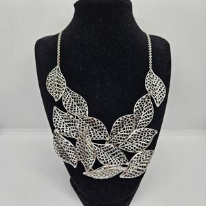T&R silver tone leaf bib necklace